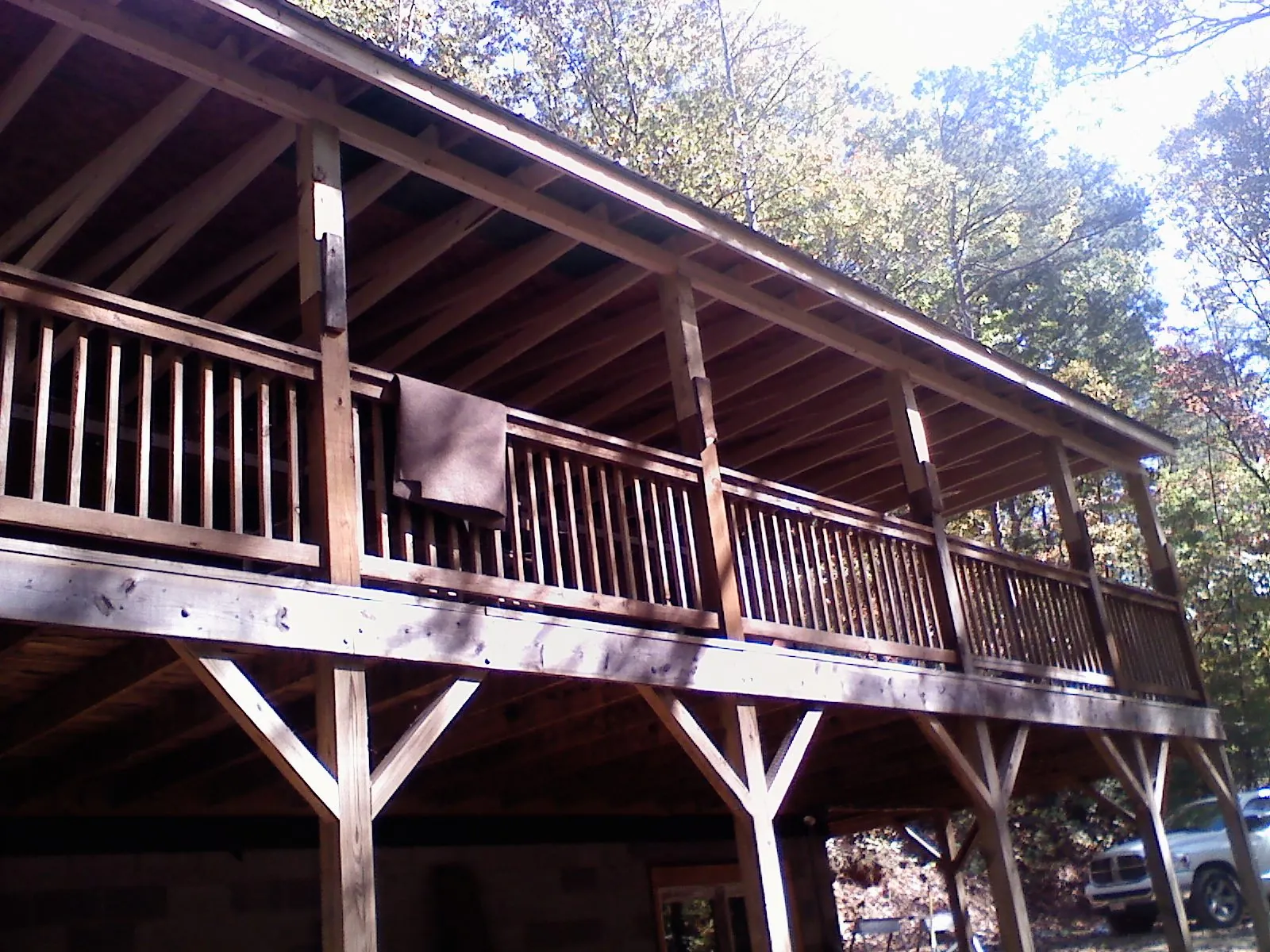 Timber framing under a new elevated porch and deck — Roof Leak Repair in East Hickory by Roofing Brothers